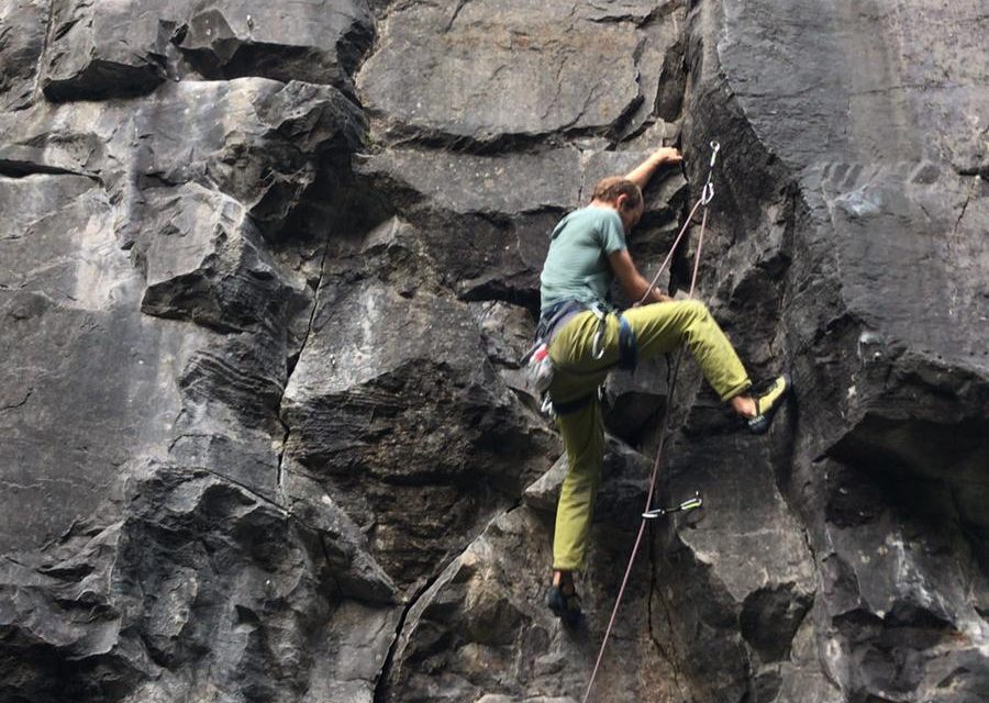 IamDAP: Jonas Zielinski climbing a stone wall